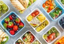 Flat-lay of colorful foods representing healthy school lunches