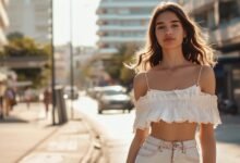 Stylish girl wearing feminine babydoll top with empire waist and flared silhouette fashion editorial look