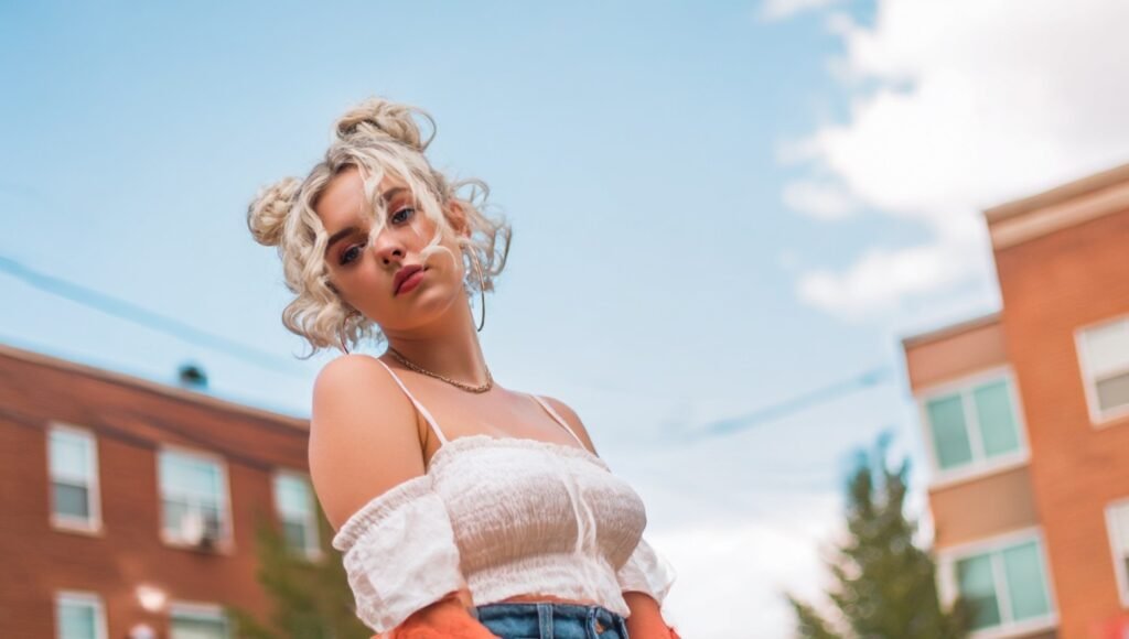 Soft coquette style babydoll top with off shoulder sleeves