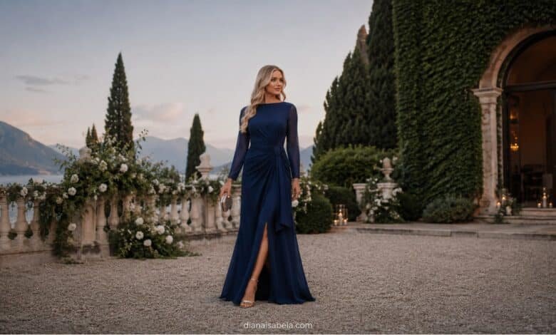 Navy long sleeve wedding guest dress styled with refined accessories for an elegant lakeside villa celebration