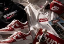 Nike x Supreme: What’s Worth the Hype and What’s Not 4 Nike x Supreme streetwear flat lay with red and white sneakers, hoodies, skateboard, pouch, magazine, and hype collab fashion details