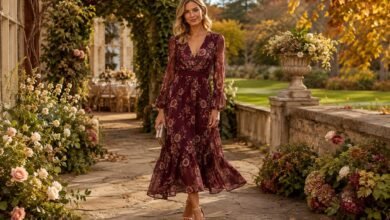 Fall garden wedding guest dress in burgundy floral chiffon styled for a romantic autumn estate ceremony.