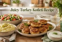 Juicy turkey kotleti served with mashed potatoes, cucumber tomato dill salad and creamy dill sauce