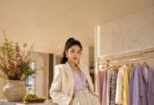 New fashion drops boutique scene with a stylish pastel outfit, curated clothing rack, fresh accessories, flowers, and modern shopping inspiration
