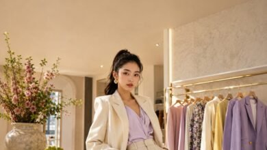 New fashion drops boutique scene with a stylish pastel outfit, curated clothing rack, fresh accessories, flowers, and modern shopping inspiration