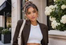 Stylish young woman in a modern TikTok-inspired outfit with Acubi, soft sporty and minimalist fashion details for 2026 trend styling.