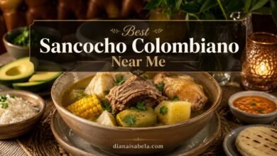 Colombian sancocho with beef, chicken, yuca, plantain, corn, rice, avocado and arepa