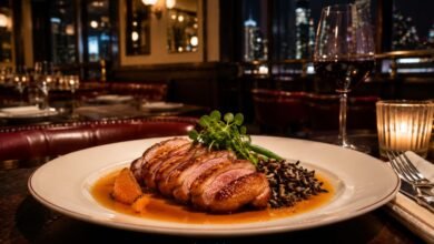 Duck à l’orange served in an elegant New York French brasserie