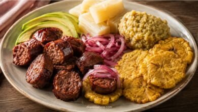Dominican longaniza frita with tostones mangú yuca onions and avocado