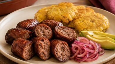 Reheated Dominican longaniza with browned casing and juicy interior