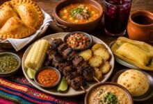 Bolivian anticuchos with potatoes, salteñas, soup, huminta, llajua and traditional drinks